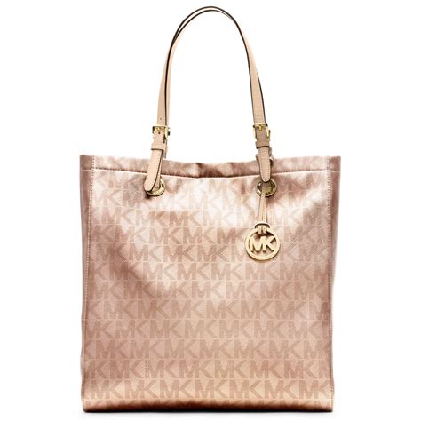 michael kors purse with rose gold hardware|Michael Kors gold metallic purse.